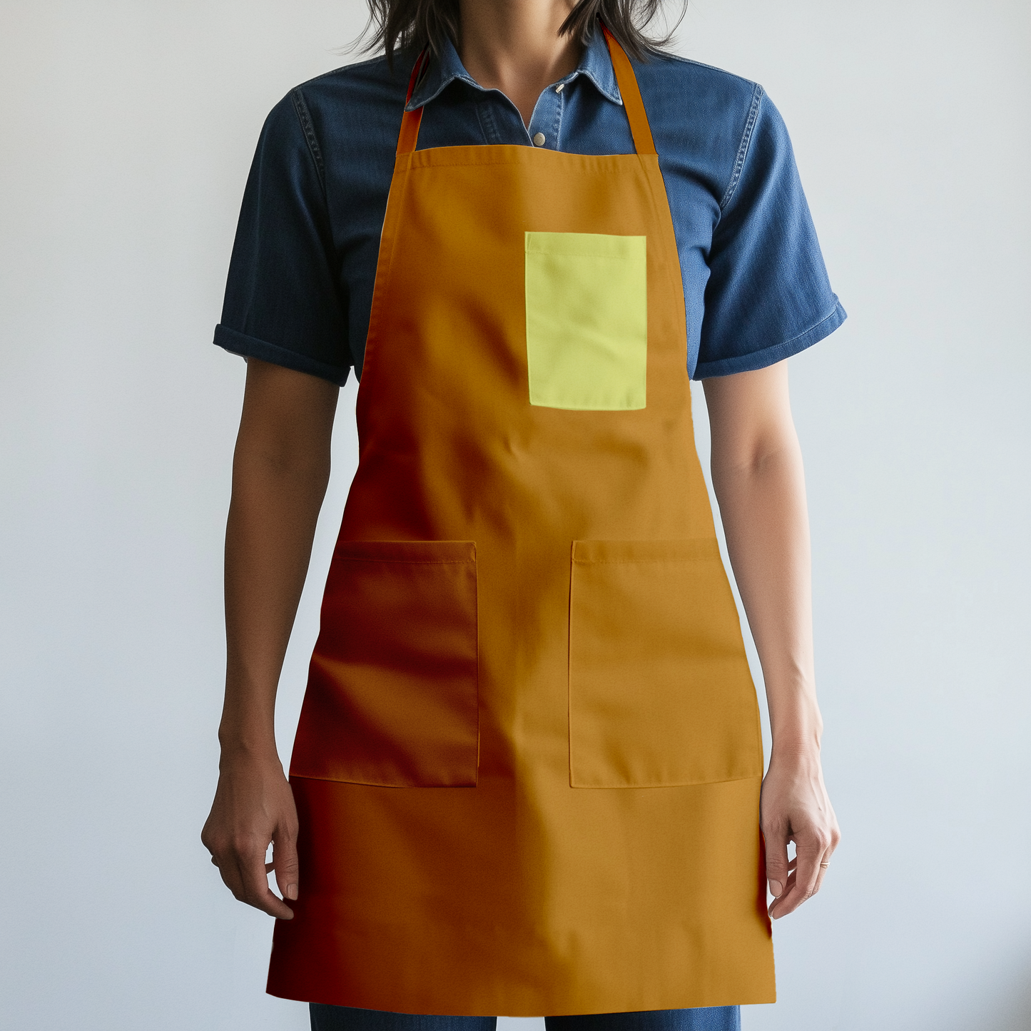 Solid Full Chef Apron in Light Orange with Yellow Pocket in Mid Weight Cotton Twill
