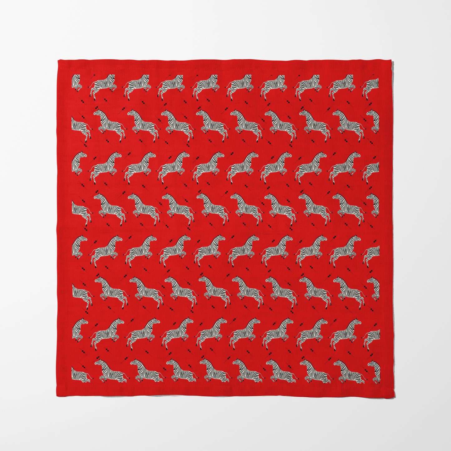 Leaping Zebras Napkin in Red in Organic Cotton Voile