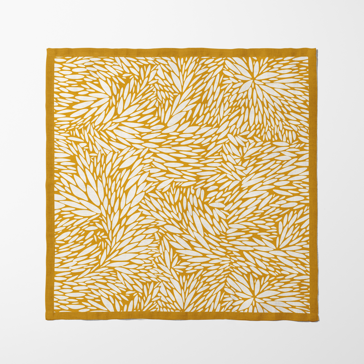 A Queen's Kiss Golden Napkin in Lightweight Linen