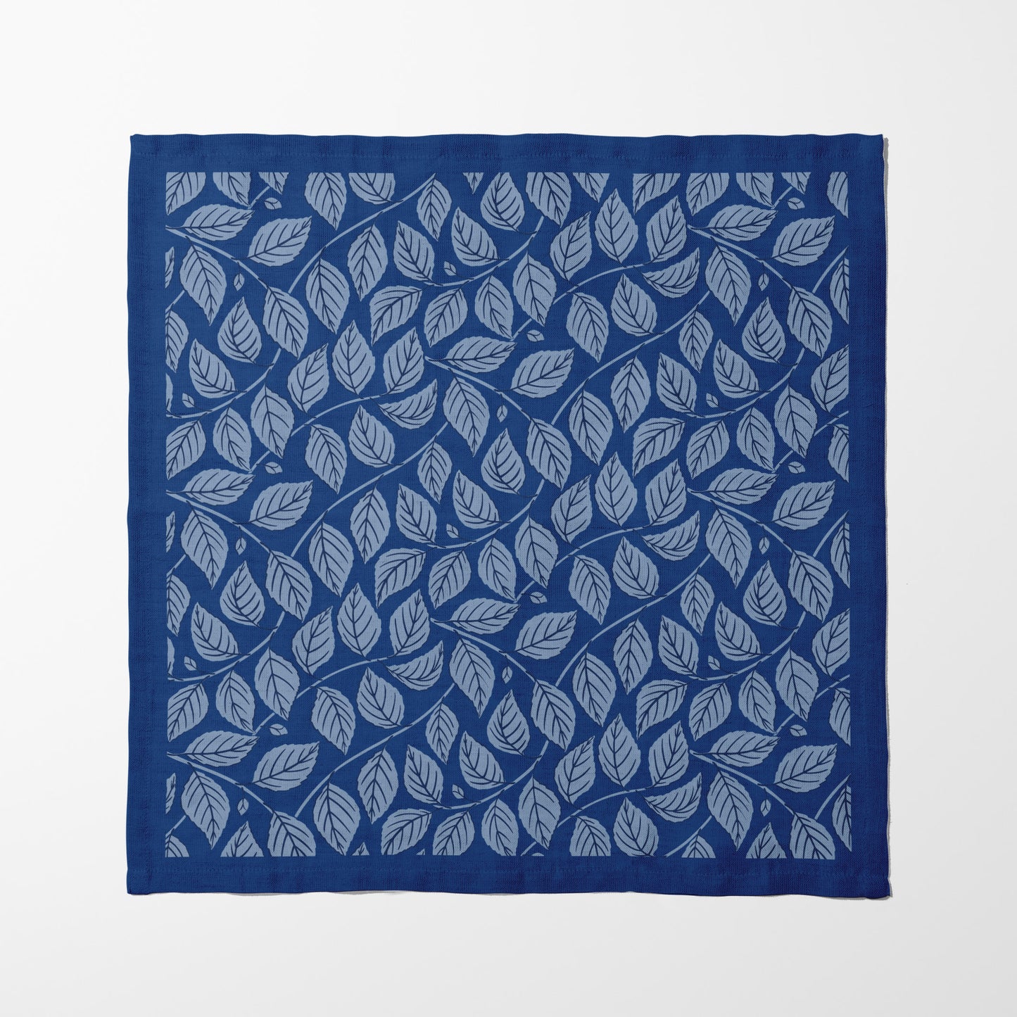 Bowing Birch Leaves in Blue Napkin in Lightweight Linen