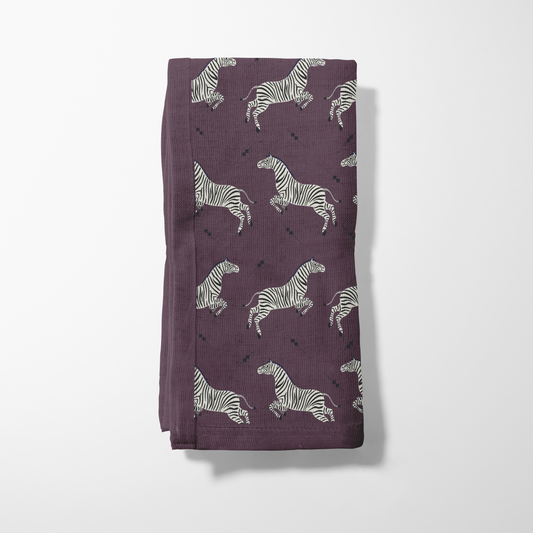 Leaping Zebras Napkin in Plum