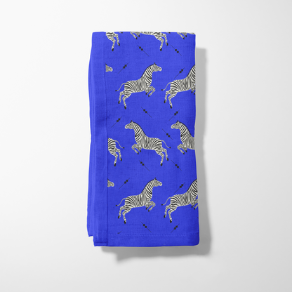 Leaping Zebras in Blue Napkin