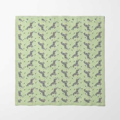 Leaping Zebras Napkin in Lime Cream