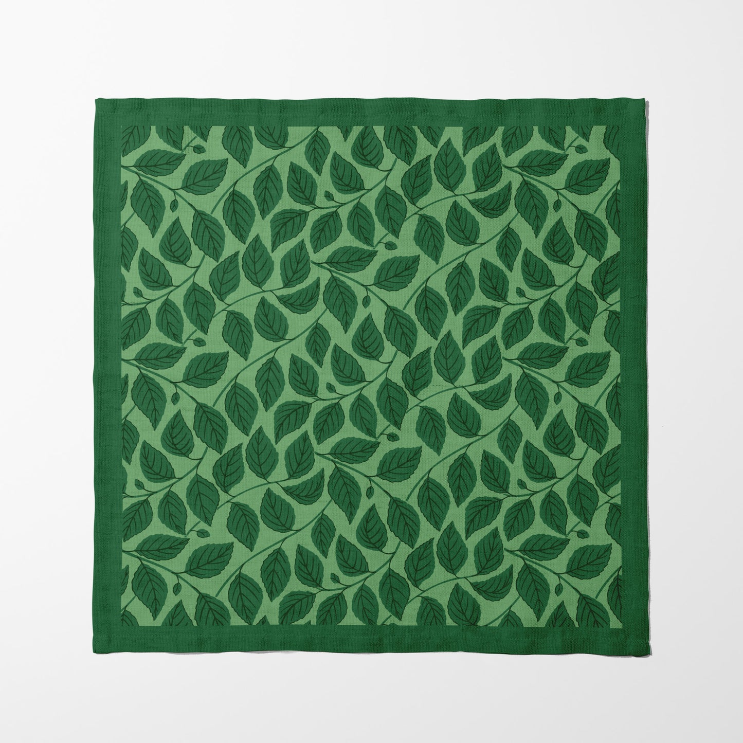 Bowing Birch Leaves in Green Napkin in Lightweight Linen