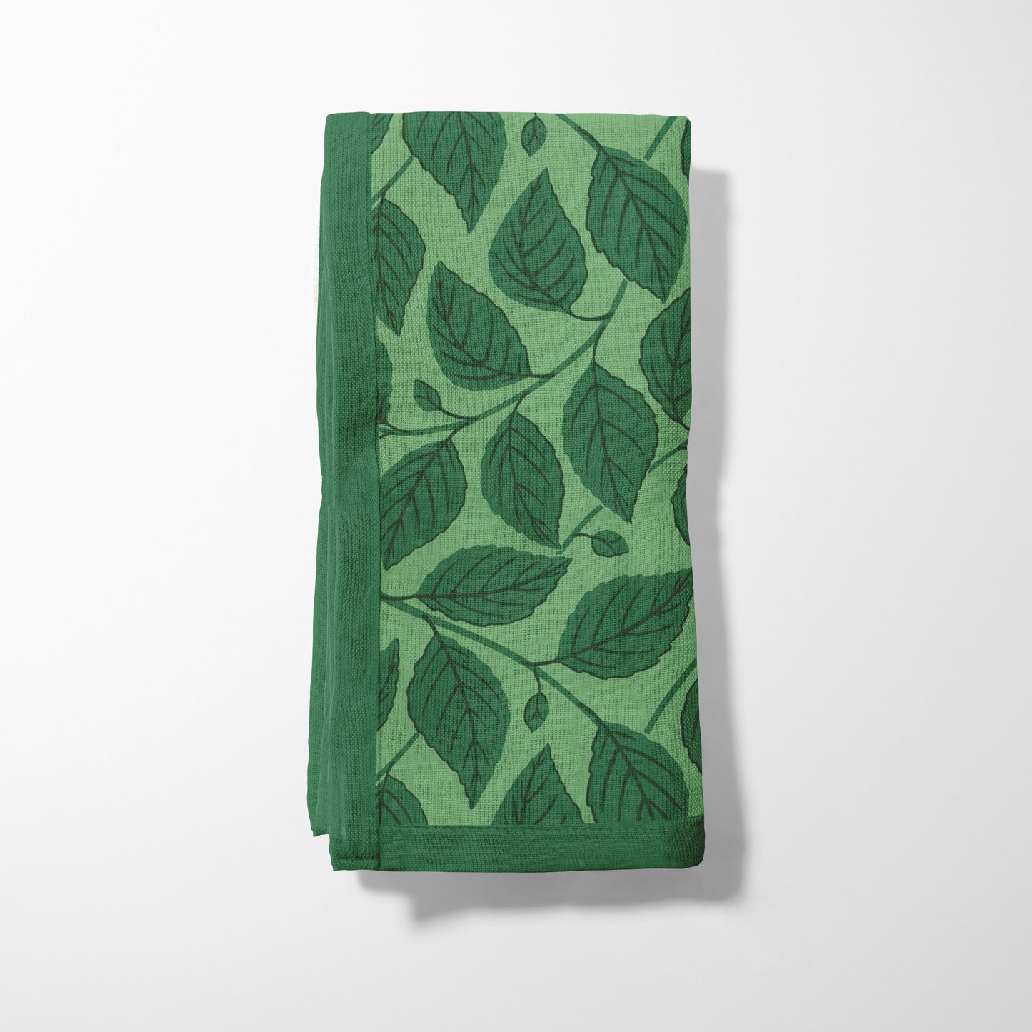 Bowing Birch Leaves in Green Napkin in Lightweight Linen