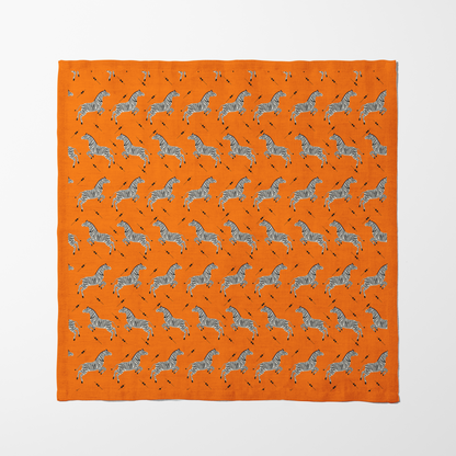 Leaping Zebras Napkin in Burnt Orange in Organic Cotton Voile