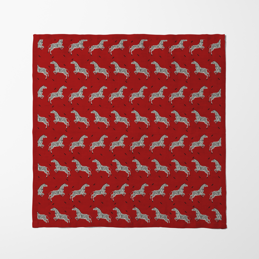 Leaping Zebras Napkin in Deep Red in Lightweight Linen