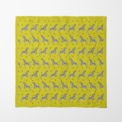 Leaping Zebras Napkin in Yellow in Organic Cotton Voile