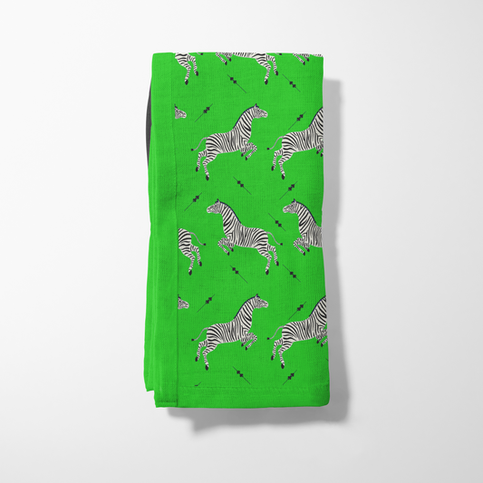 Leaping Zebras Napkin in Bright Green in Lightweight Linen